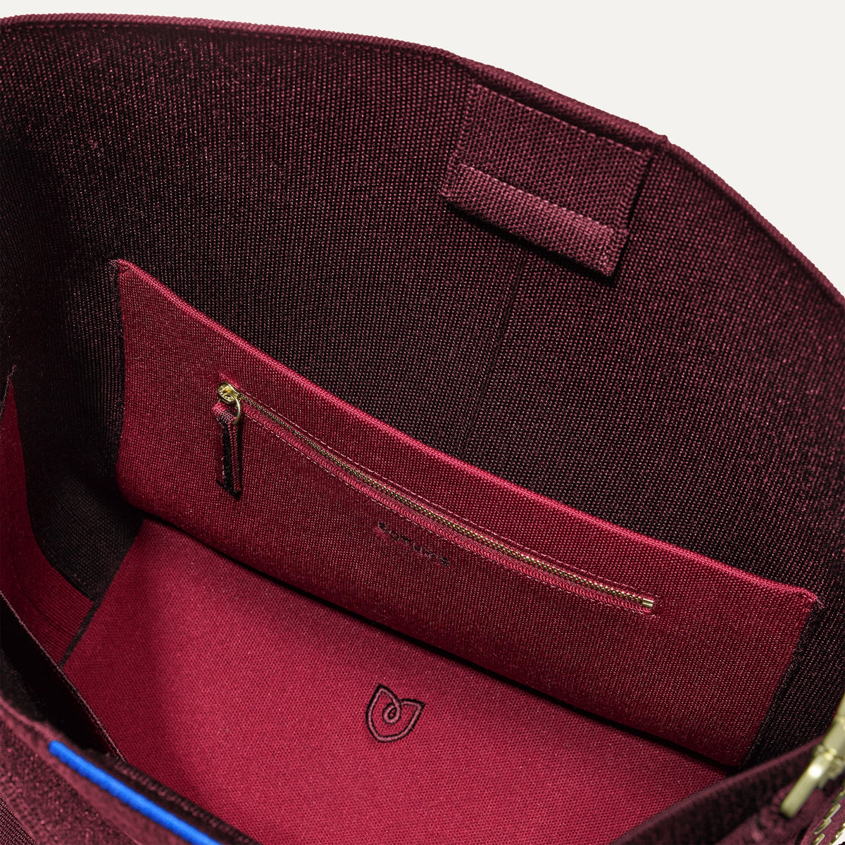 The Bucket Bag in ReVelvet™ close up of interior zipper pocket.