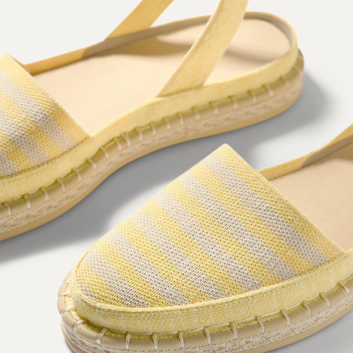 Close up of the vamp of The D'Orsay Espadrille in Sunshine Stripe.