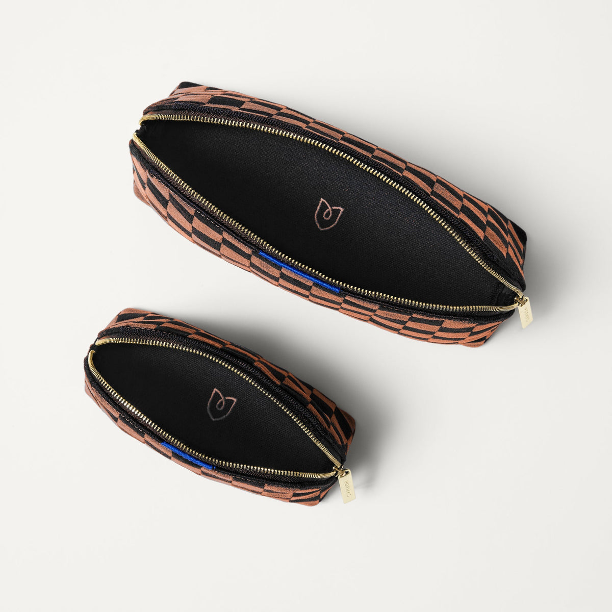 The Vanity Set in ReVelvet™ Umber Check shown from the top with zipper closure open.