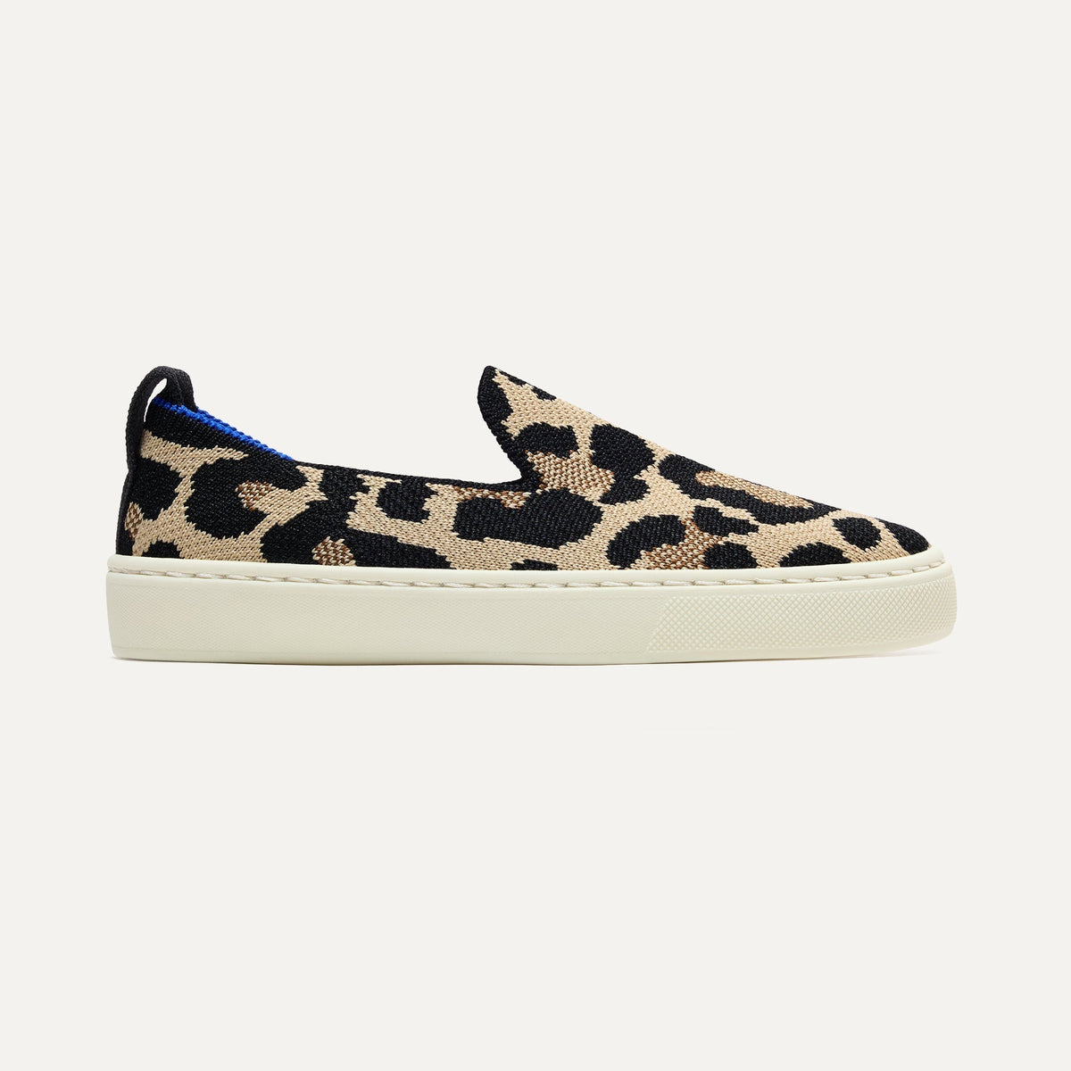 side | The Kids Sneaker in Desert Cat, shown from the side.