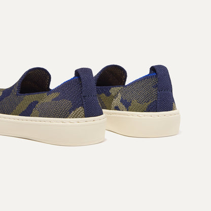 Close up of the heel of The Kids Sneaker in Spruce Camo, with shimmery gold pull tab.