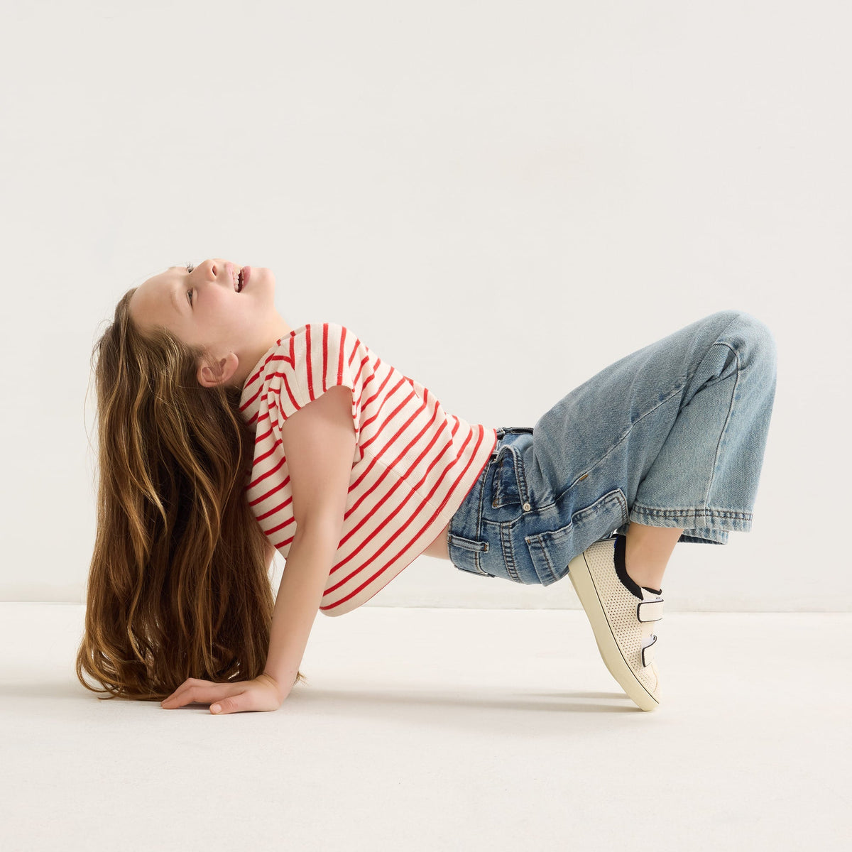 model | Alternate image of a girl modeling The Kids Strap Sneaker in Chess Open-Knit.