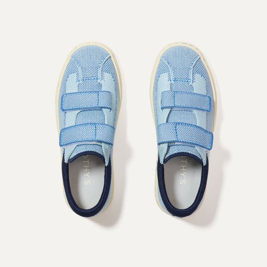 The Kids Strap Sneaker in Berry Blue shown from the top.