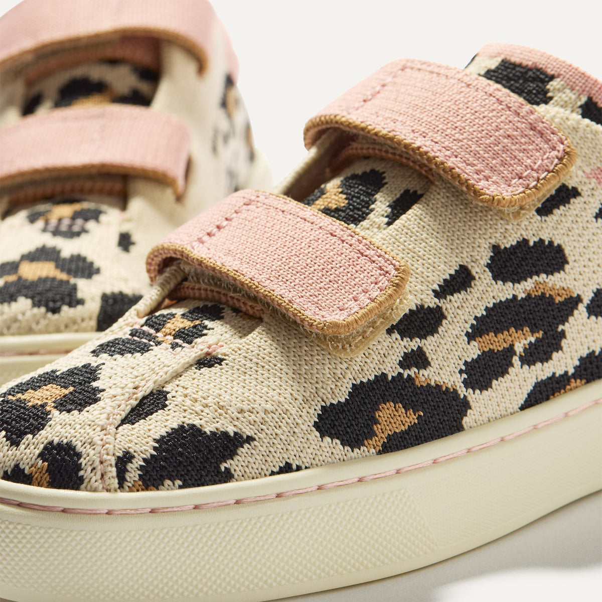 Close up of the vamp of The Kids Strap Sneaker in Cat Blush.