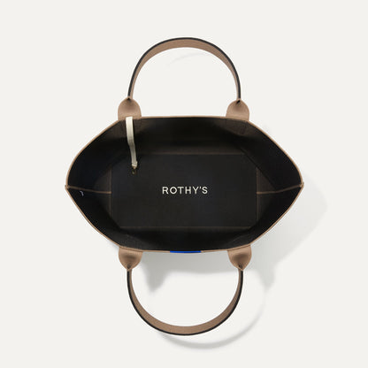 The Lightweight Tote in Black Portobello shown open from the top, with base insert visible.