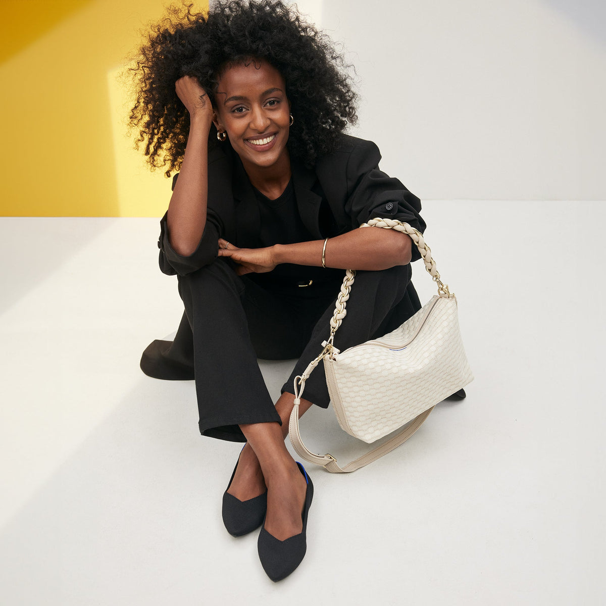Overlay:: Shown with The Shoulder Strap (sold separately.) | Alt:: The Daily Crossbody in White Sand paired with The Shoulder Strap in White.