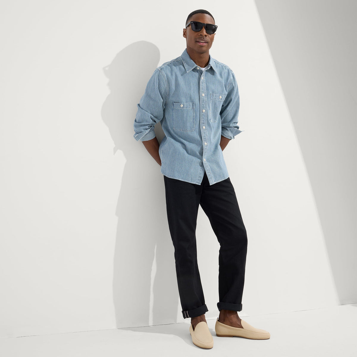 model | Alternate view of a model wearing The Ravello Loafer in Sand.