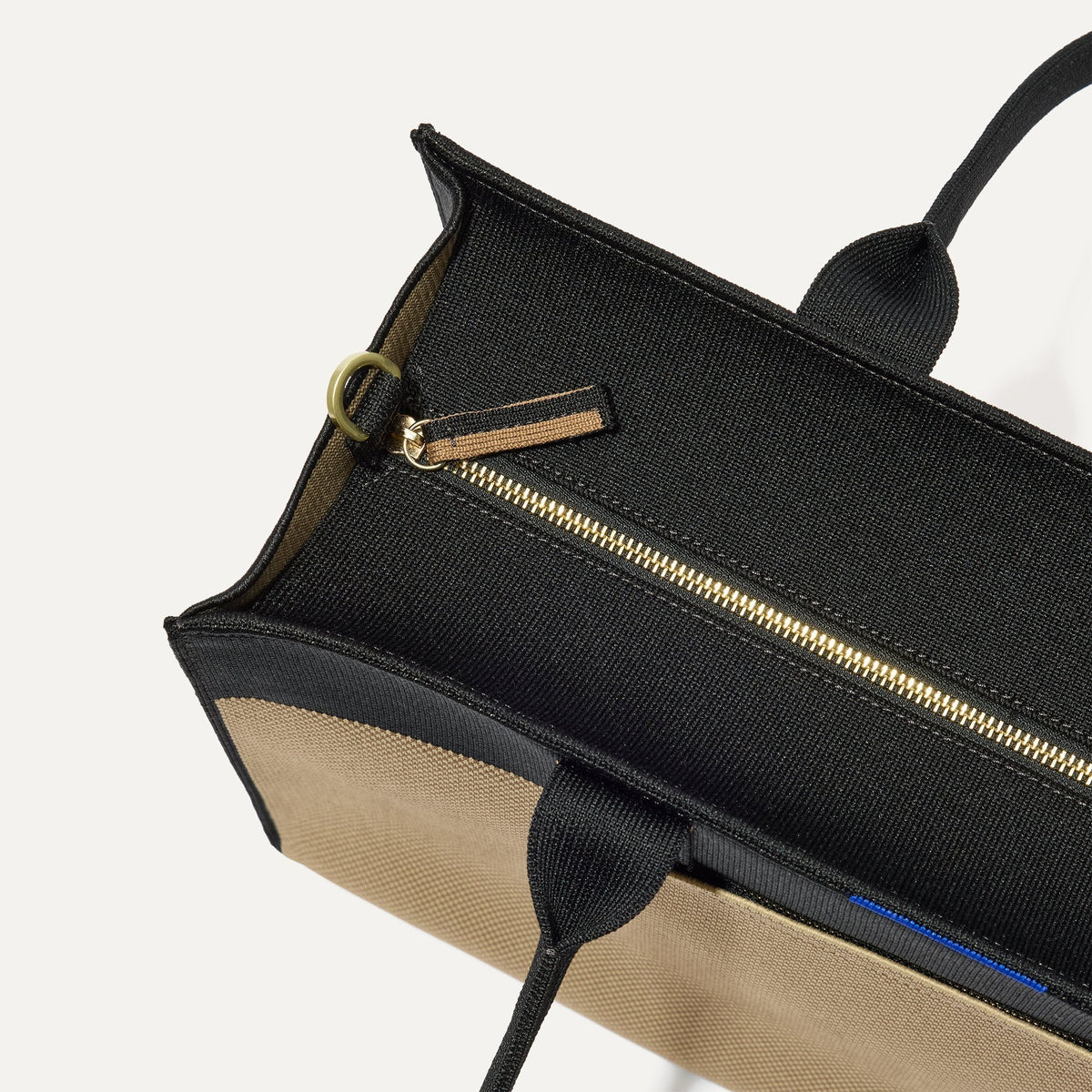 The Classic Tote in Tiramisu, shown from above, with the top zipper closed.