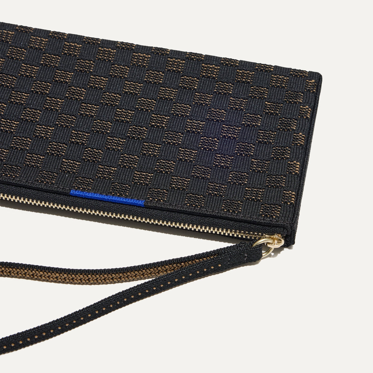 A closeup of The Wallet Wristlet in Night Song, focusing on the wrist strap.