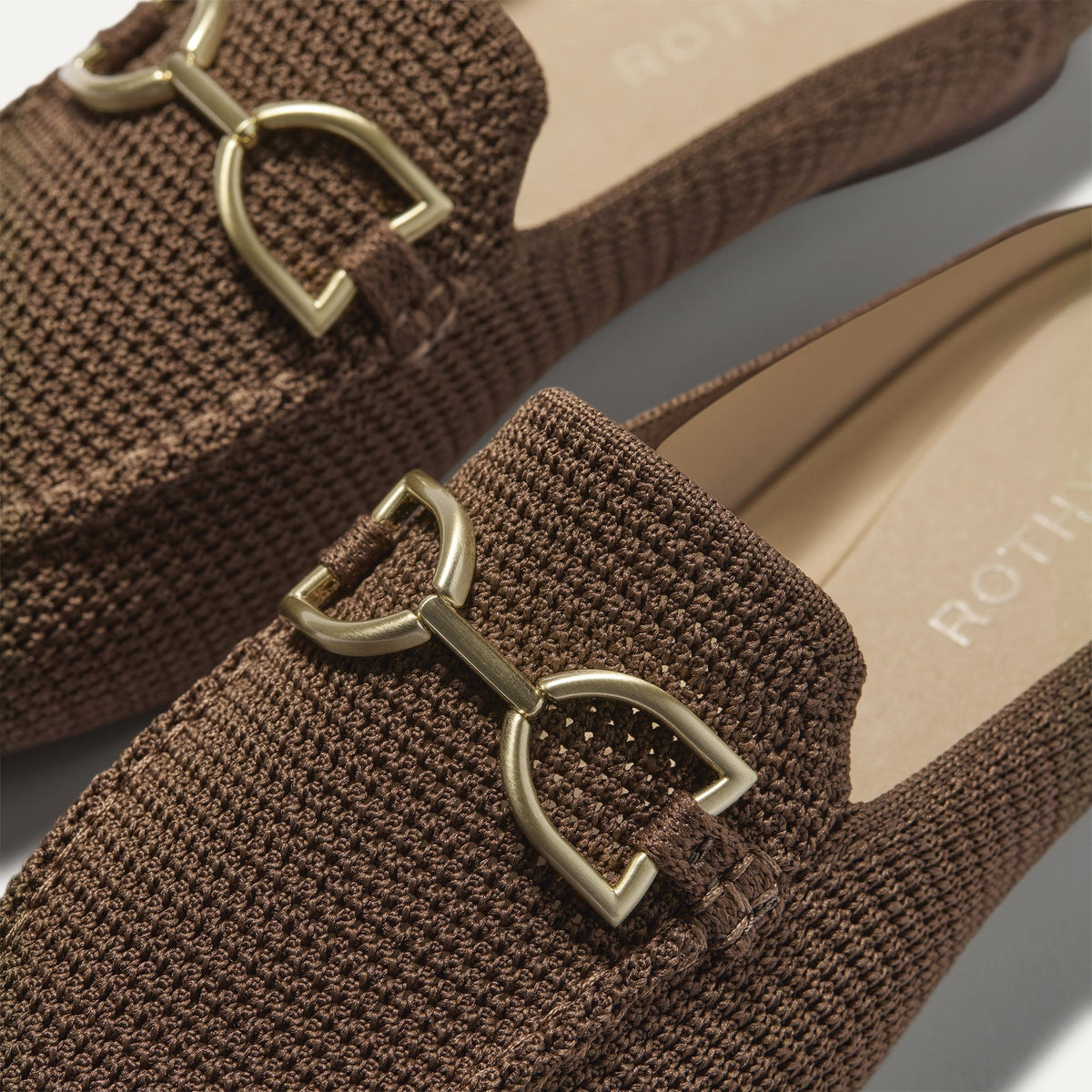 Close up of the toe and hardware of The Double Bit Loafer Mule in Cinnamon Raffia-Knit.