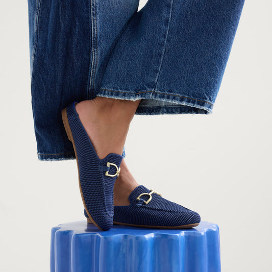 hover | Model wearing The Double Bit Loafer Mule in Blue Raffia-Knit.