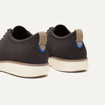 Close up of the heel of The Oxford in Deep Brown, with Rothy's signature blue halo.