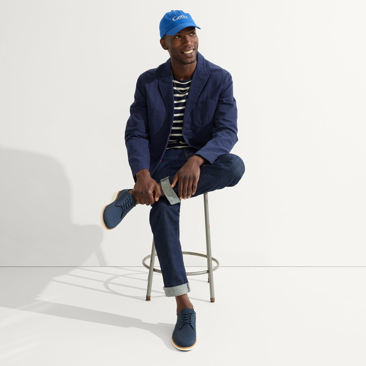 model | Alternate view of a model wearing The Oxford in Night Navy.