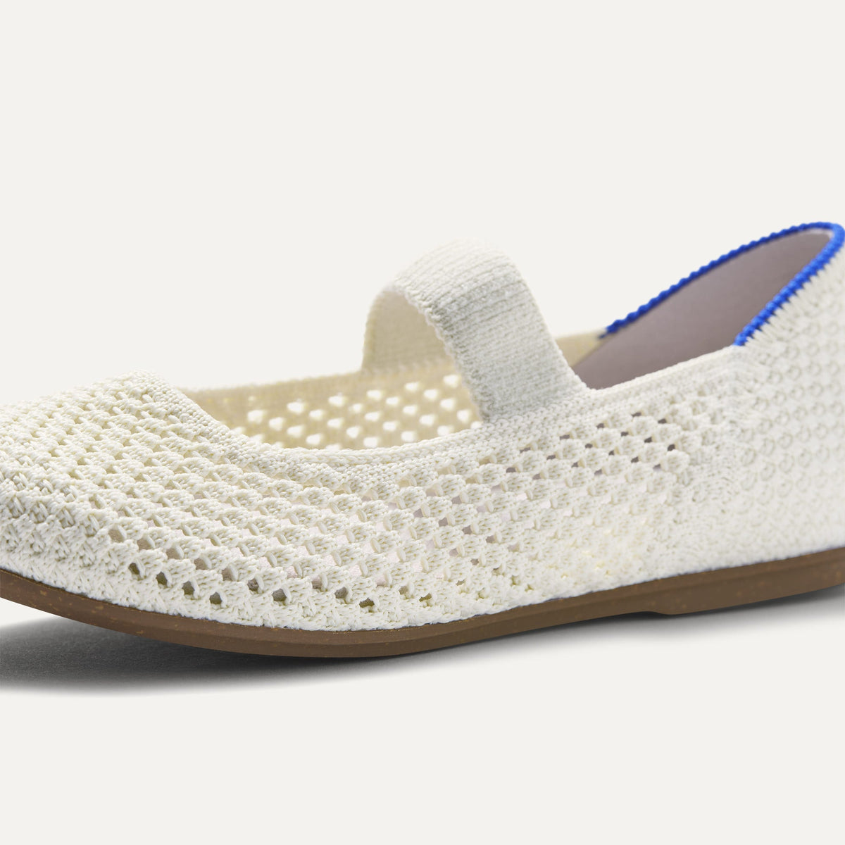 Close up of the toe and vamp of The Kids Mary Jane in White Open-Knit.