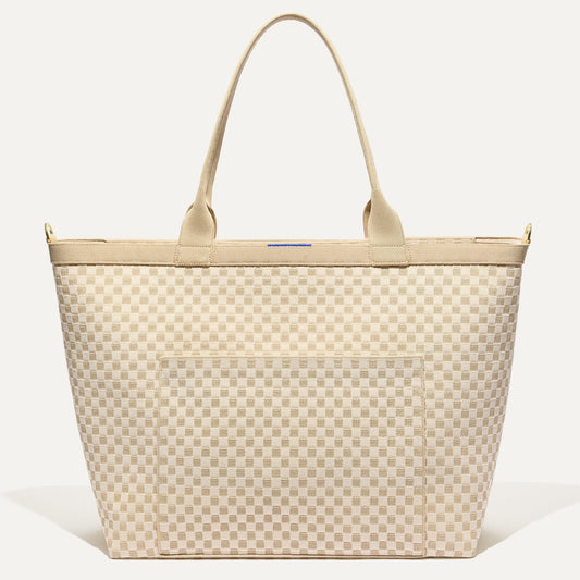 PLP |The Zip Travel Tote in Parchment Basketweave shown from the front.