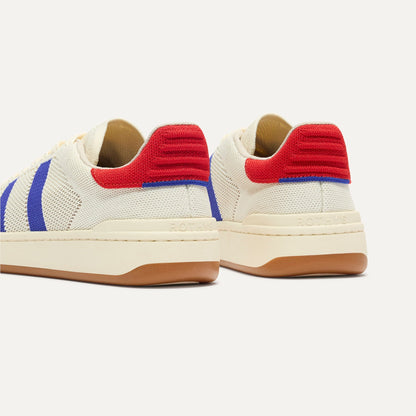 Close up of the heel of The Men's Court Sneaker in Turbo Blue, with Rothy's signature blue halo.