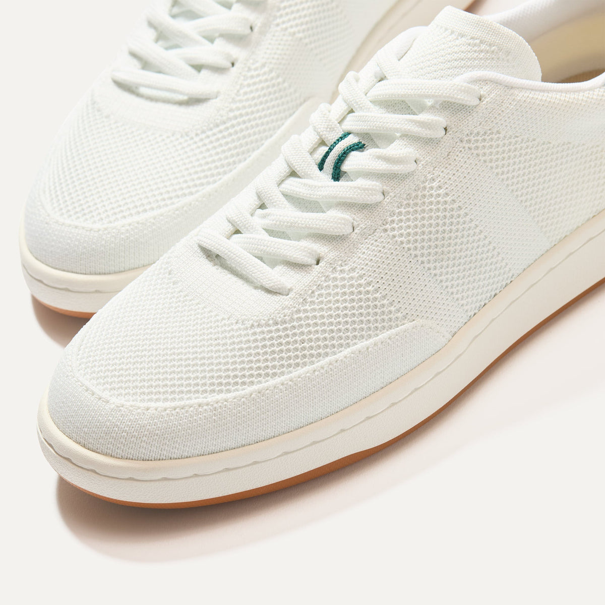 Close up of the toe and stitching details of The Men's Court Sneaker in Turf.