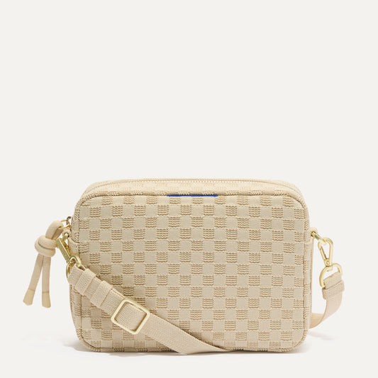 PDP |The Crossbody Camera Bag in Sesame, shown from the front.