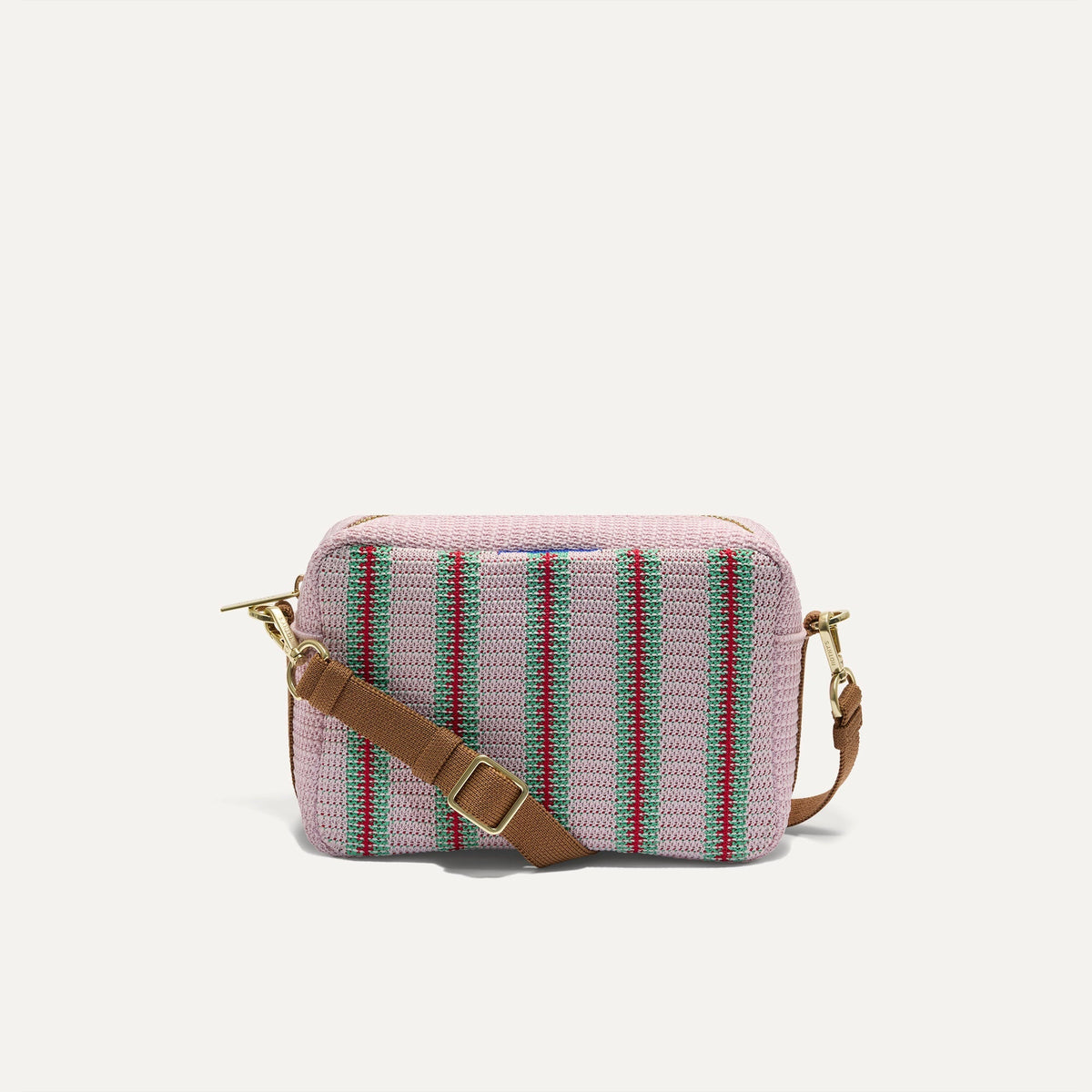 PLP |The Crossbody Camera Bag in Watermelon Market Stripe, shown from the front.