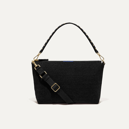 PLP | The Daily Crossbody in Revelvet™ Black shown from the front.