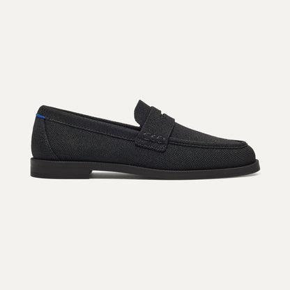 side | The Penny Loafer in Black shown from the side.