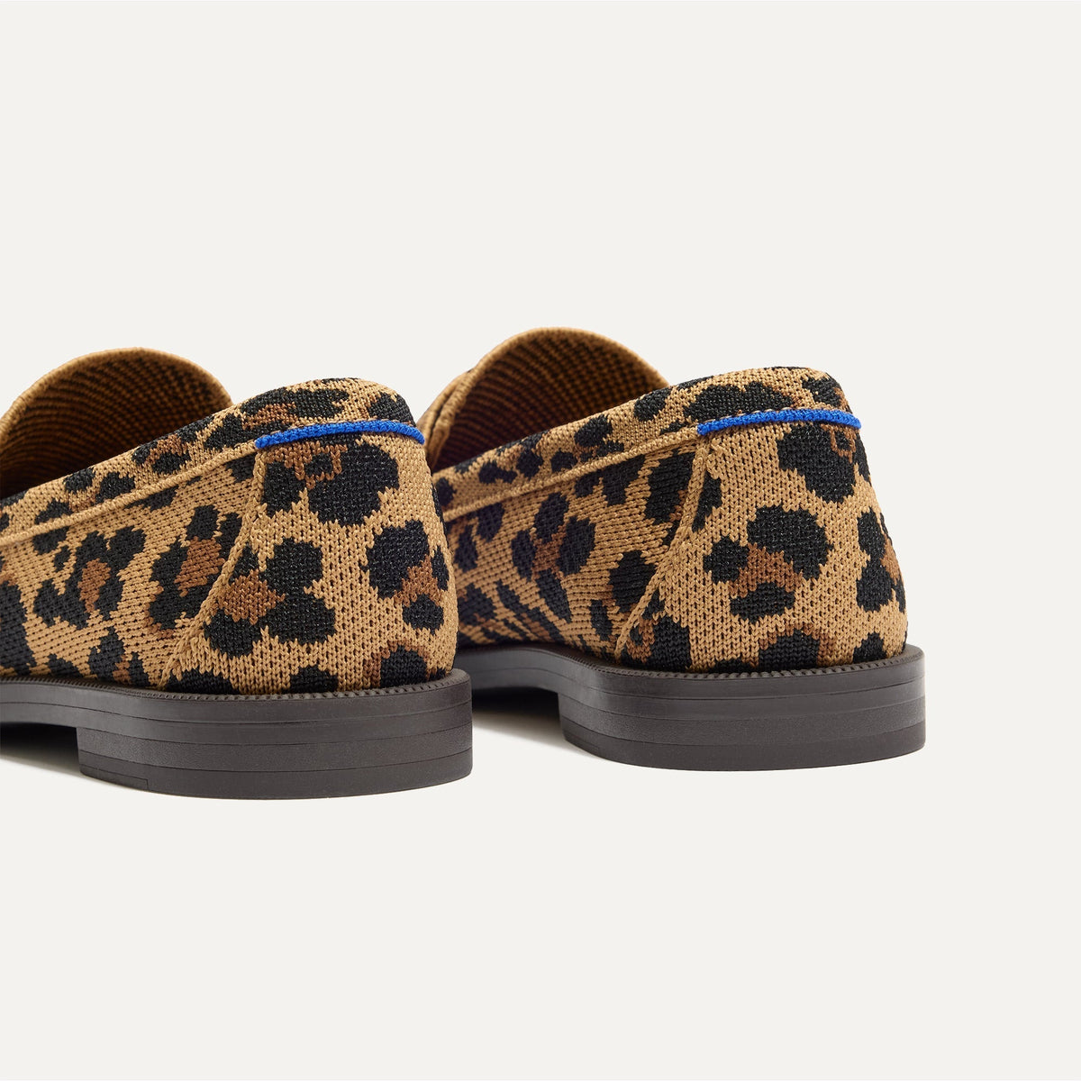 Close up of the heel of The Penny Loafer in Classic Cat, with Rothy's signature blue halo.