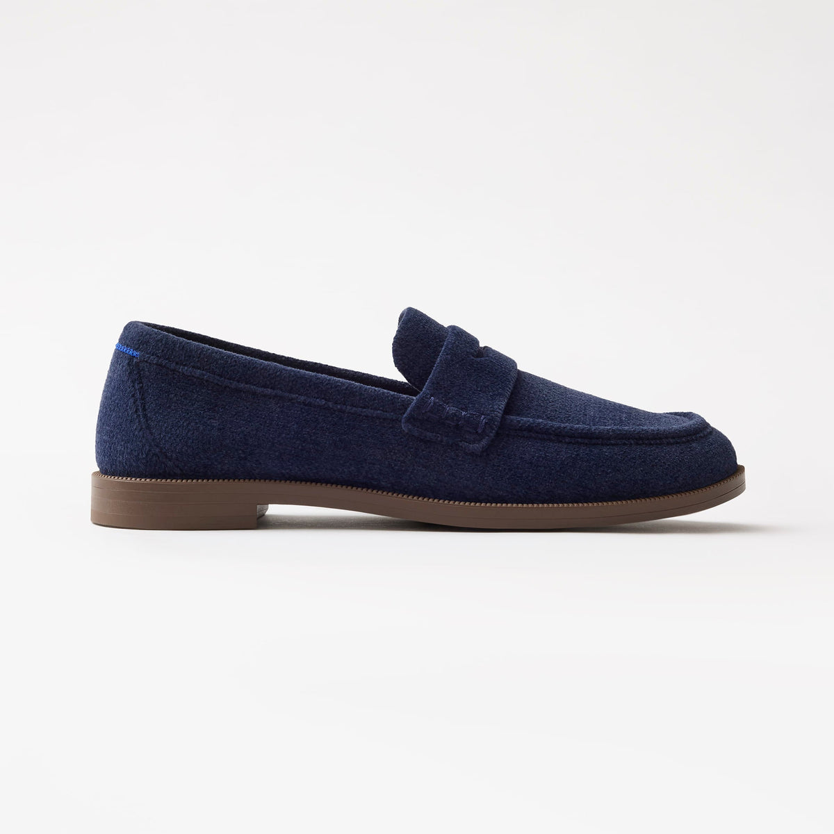side | The Penny Loafer in ReVelvet Navy shown from the side.