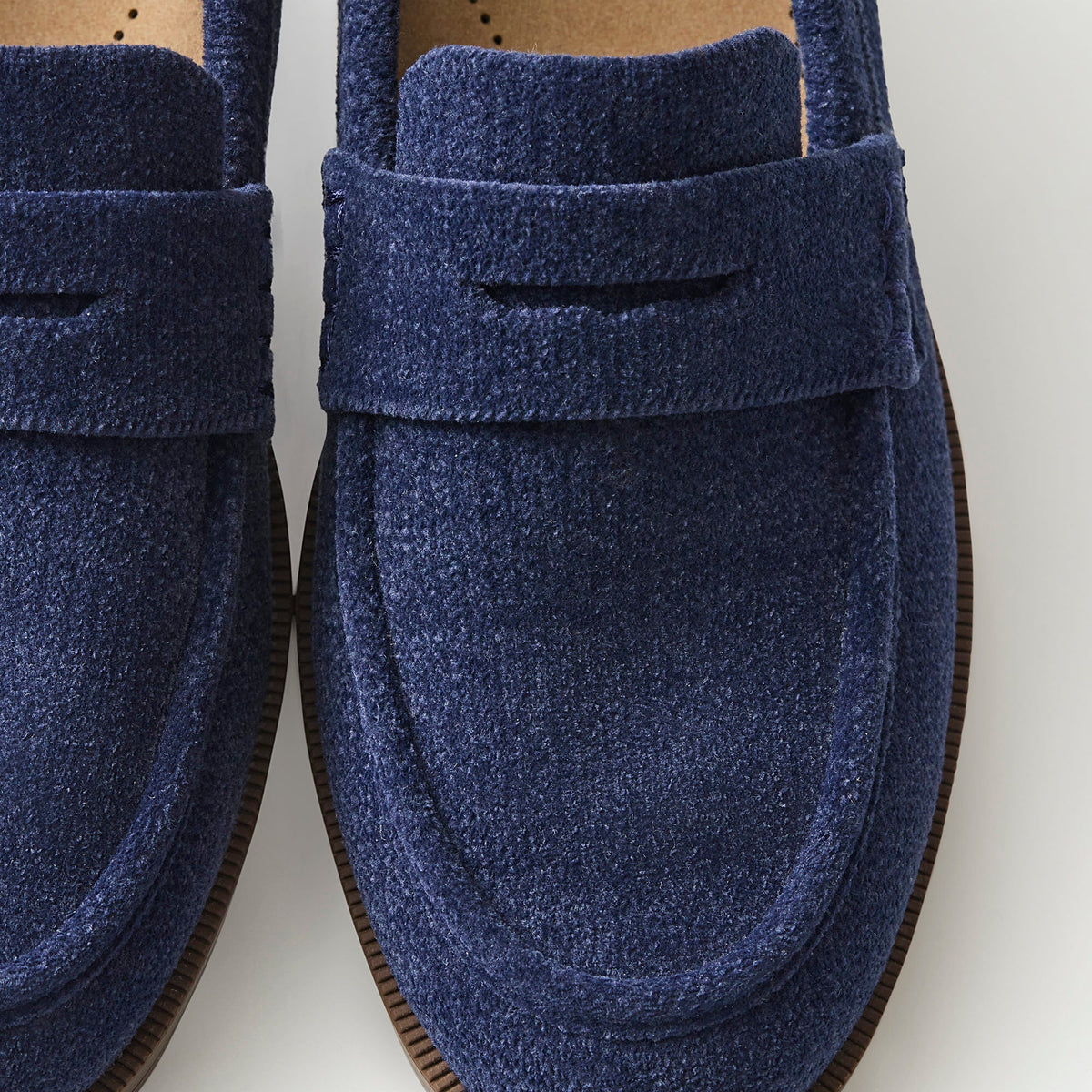 macro | Close up of the toe box and penny keeper of The Penny Loafer in ReVelvet Navy.
