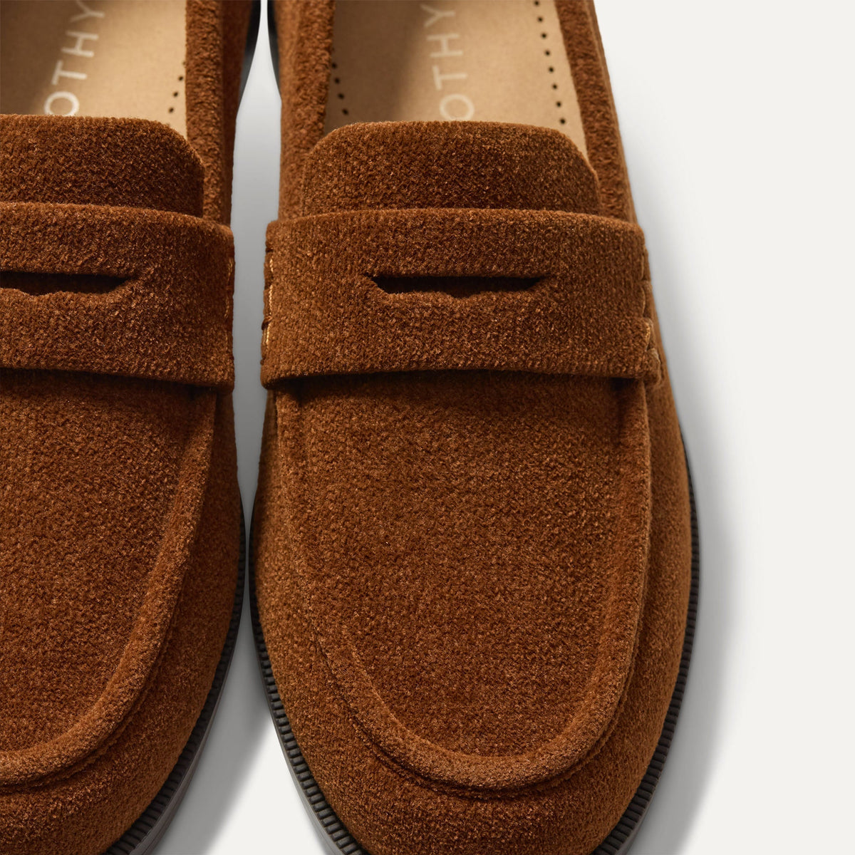 macro | Close up of the toe box and penny keeper of The Penny Loafer in ReVelvet Russet.