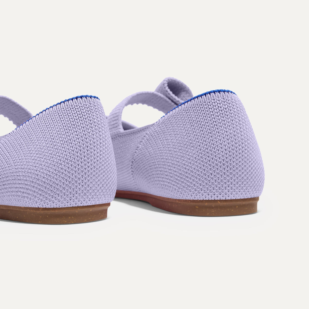 Close up of the heel of The Kids Tux Bow Mary Jane in Soft Orchid.