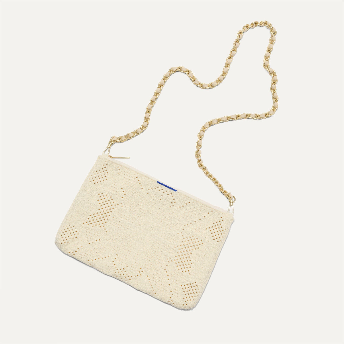 Overlay::Shown with The Crossbody Strap (sold separately). | Alt:: The Convertible Clutch in Moonflower shown with The Crossbody Strap.