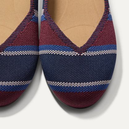 Close up of the toe and vamp of The Daily Flat in Fig Stripe.