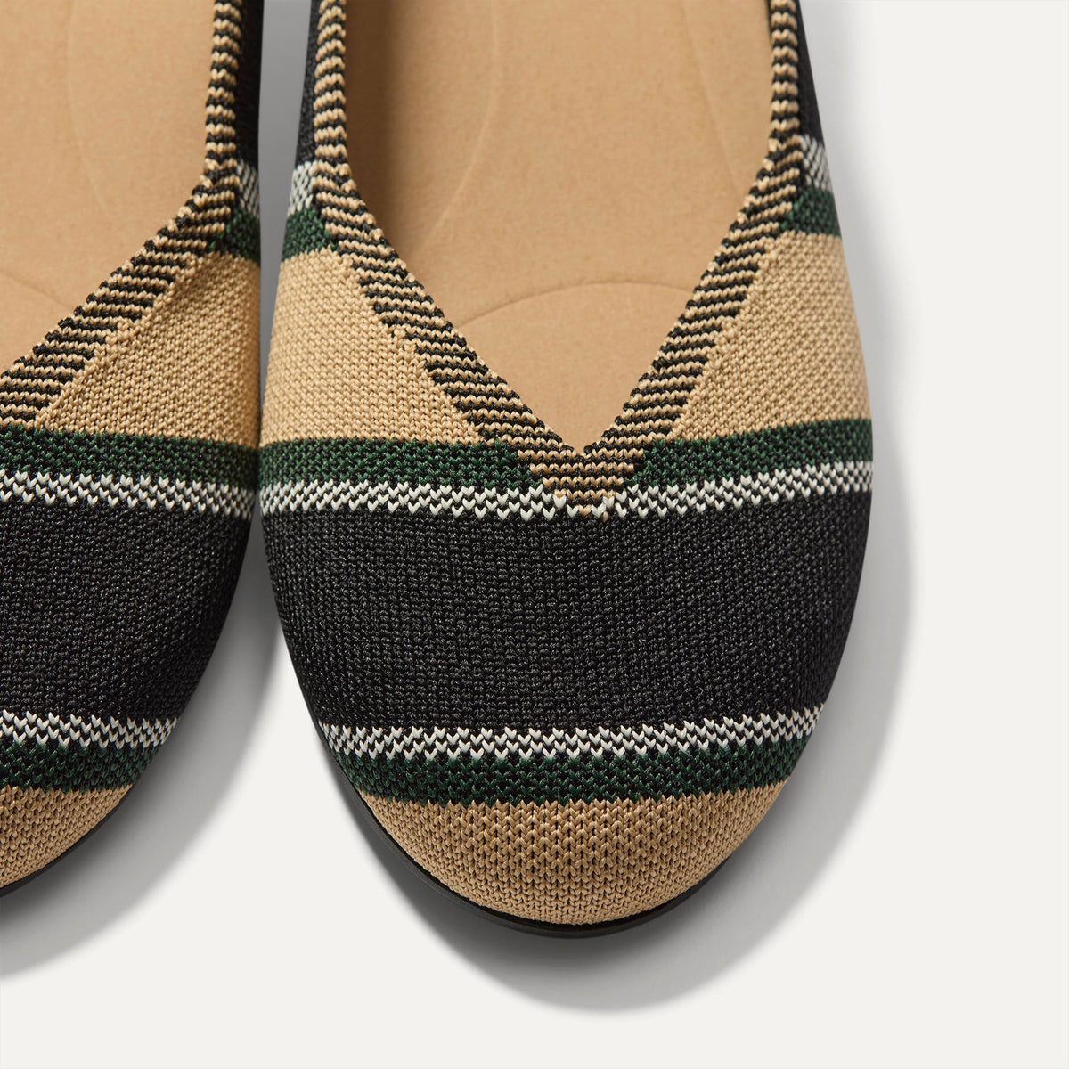 Close up of the toe and vamp of The Daily Flat in Hickory Stripe.