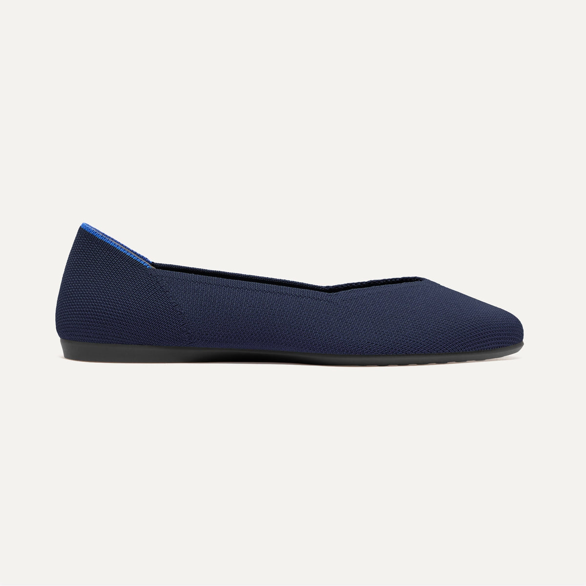 side | The Daily Flat in Navy shown from the side.