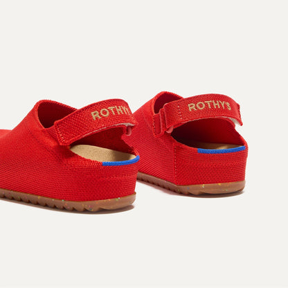 Close up of the heel of The Kids Clog in Firetruck Red, with Rothy's signature blue halo.