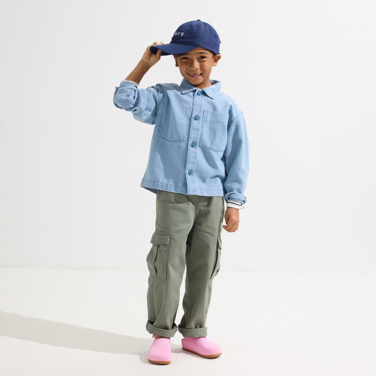 model | Alternate view of a boy wearing The Kids Clog in Tutu.