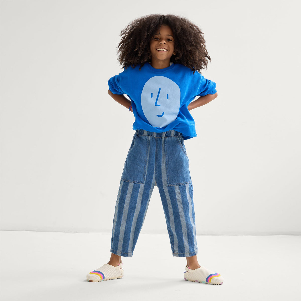 Child wearing The Kids Clog in Retro Wave.