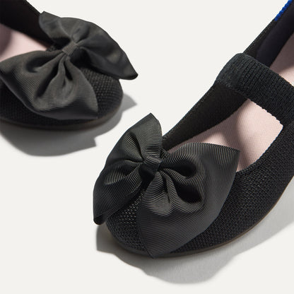 Close up of the bow detail of The Kids Big Bow Mary Jane in Black.