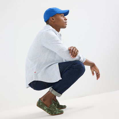 model | An alternate image of a model wearing the Men's Daily Driver in Forest Camo.
