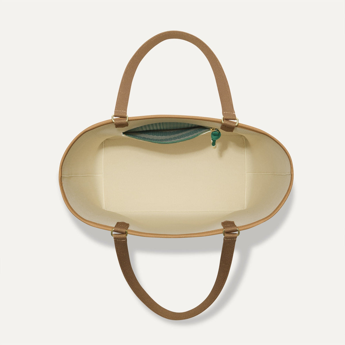 The Two-Way Tote in Ivy, shown from above, with the reversible interior exposed.
