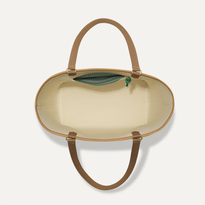 The Two-Way Tote in Ivy, shown from above, with the reversible interior exposed.