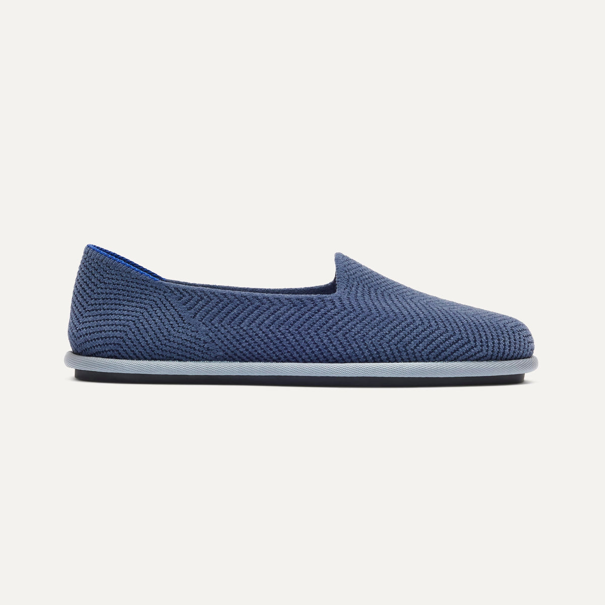 side | The Cruiser Loafer in ReVelvet Fog Herringbone shown from the side.