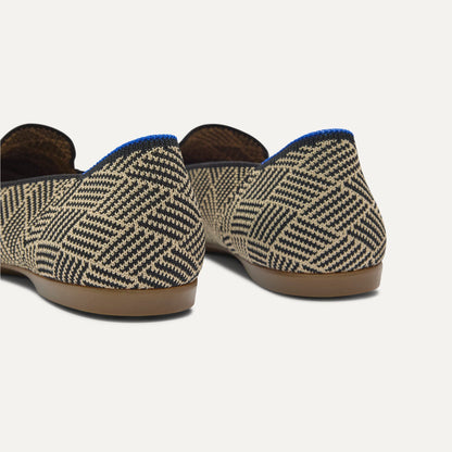 Close up of the heel of The Daily Loafer in Black Zig Zag, with Rothy's signature blue halo.