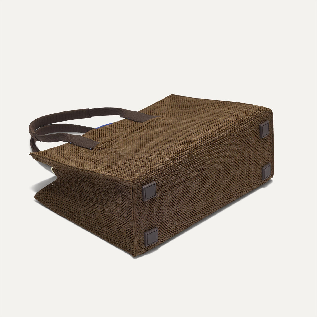 The Classic Tote in Cinnamon Open Knit, shown from the bottom.