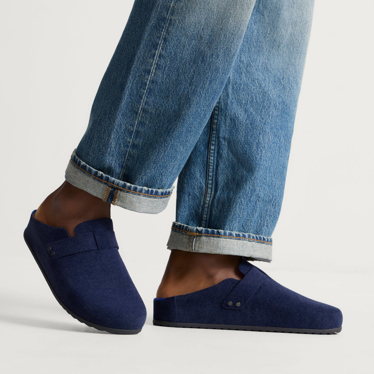hover | Model wearing The Men's Clog in ReVelvet™ Deep Navy.