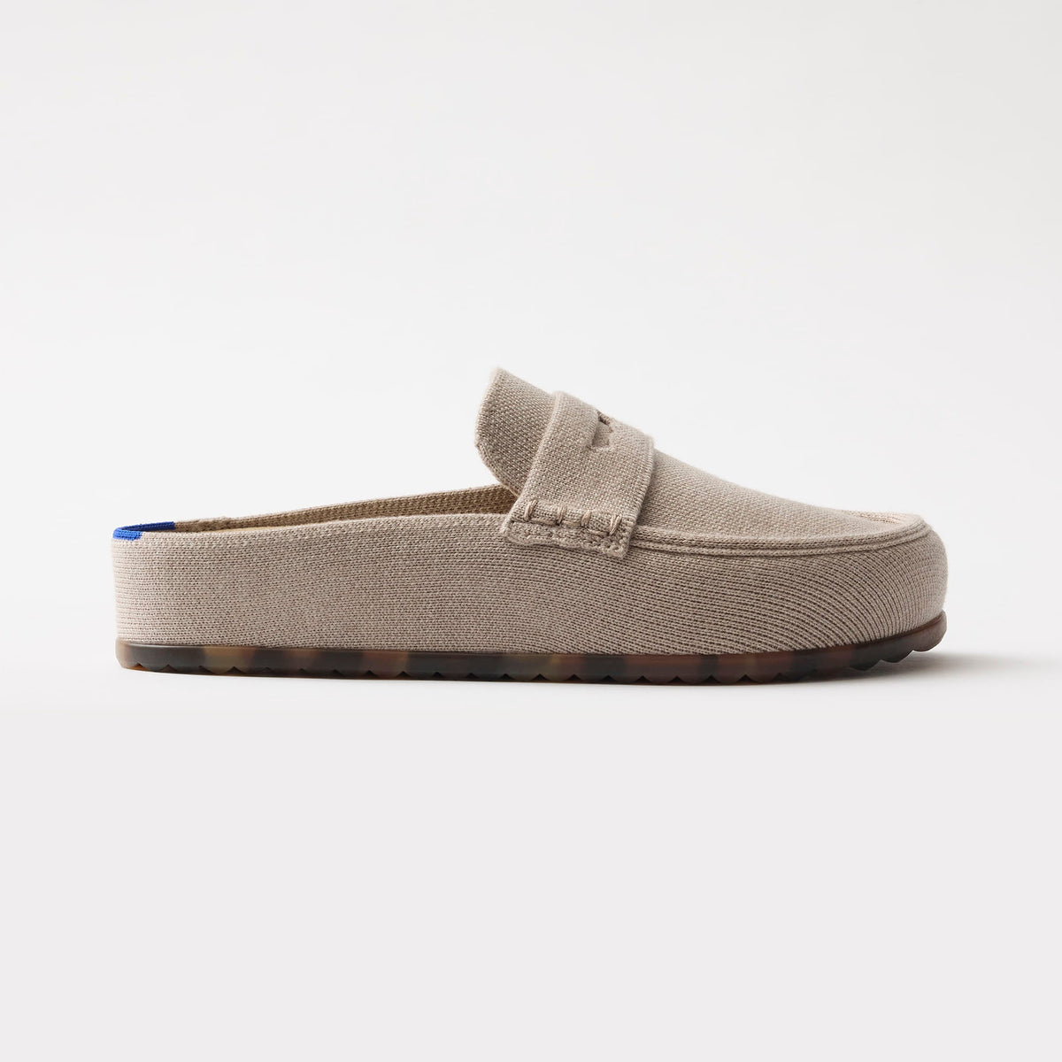 side | The Penny Clog in Dove shown from the side.