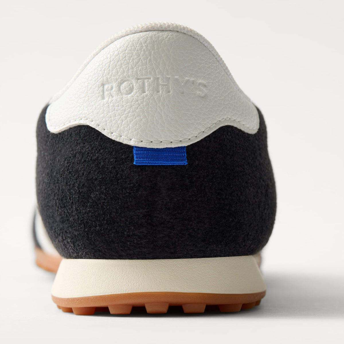 Close up of the heel of The Ivy Sneaker in ReVelvet Black.