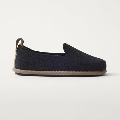 The Mini Loafer in ReVelvet™ Black shown from a side view showing the outsole.