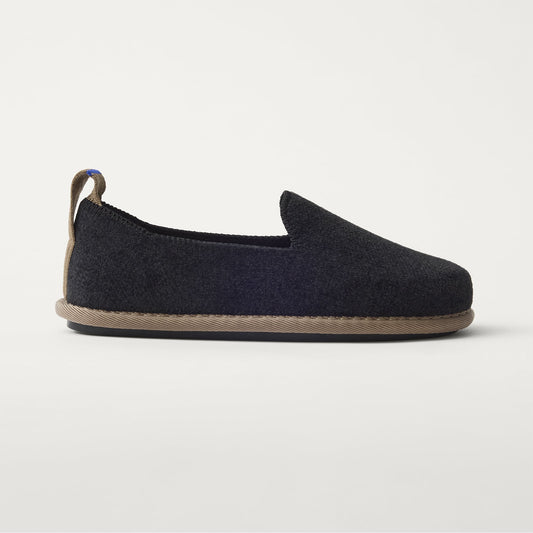The Mini Loafer in ReVelvet™ Black shown from a side view showing the outsole.