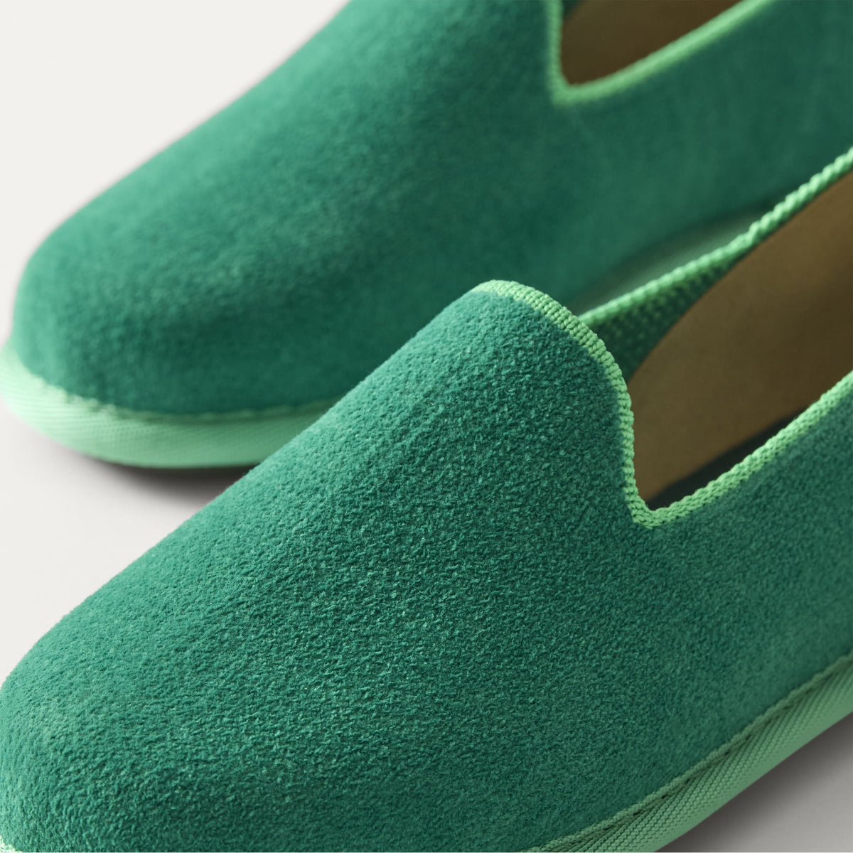 The Mini Loafer in ReVelvet™ Peapod view with detailing of the front of the shoe.